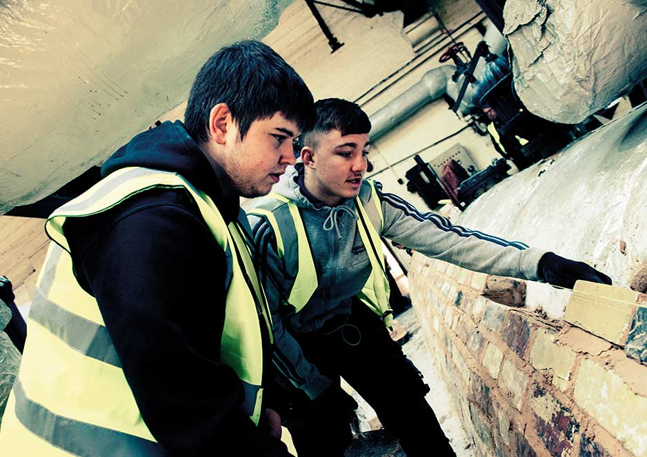 Bricklaying students work together on projects to gain communication and team-building skills.